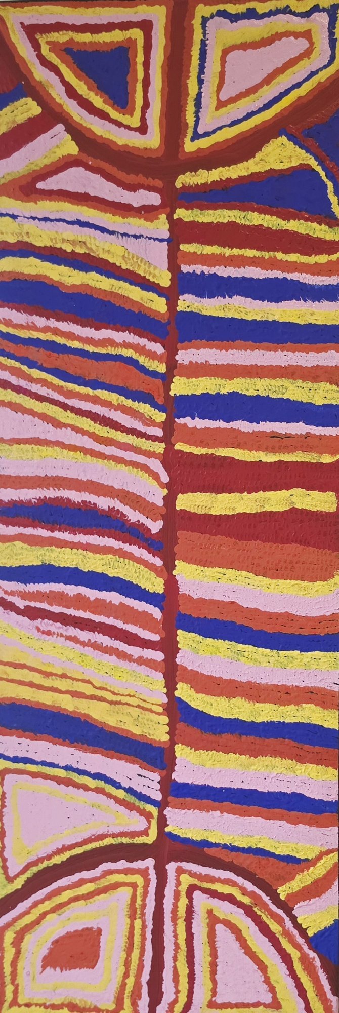 Vertical Aboriginal painting with horizontal bands of red, yellow, blue and pink radiating from a central spine, framed by rounded triangular forms at top and bottom.